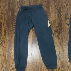 Aviator Nation Black Joggers with Gold Stripe